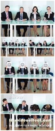 People in suits miss at a table /      