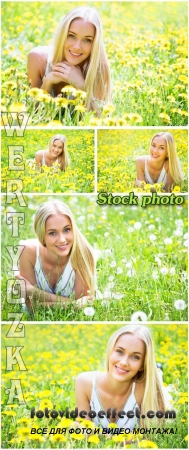        / Girl in a field with flowers and dandelions - raster clipart