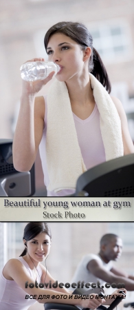 Stock Photo: Beautiful young woman at gym