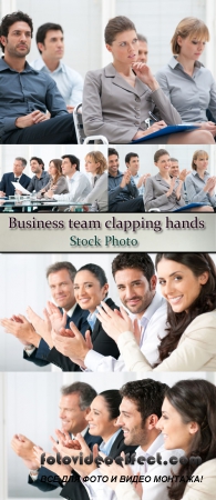 Stock Photo: Business team clapping hands