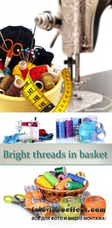Stock Photo: Bright threads in basket, scissors and measuring tape