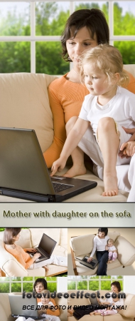 Stock Photo: Mother with daughter on the sofa