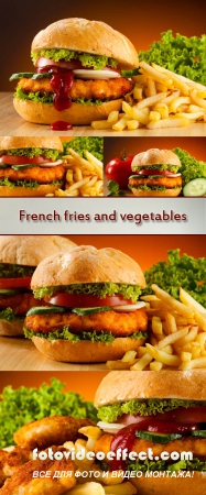 Stock Photo: Big hamburger, French fries and vegetables