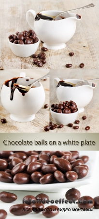 Stock Photo: Chocolate balls on a white plate