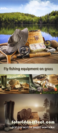 Stock Photo: Fly fishing equipment on grass