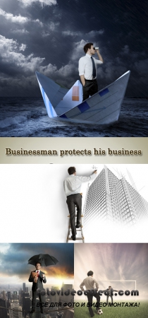 Stock Photo: Businessman protects his business