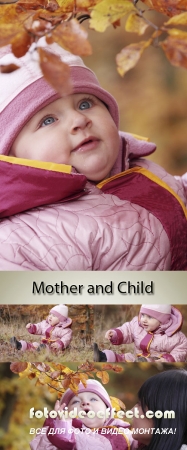 Stock Photo: Mother and child in autumn park