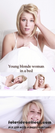 Stock Photo: Young blonde woman in a bed