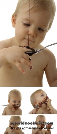 Stock Photo: Baby fond of good food, eating some chocolate