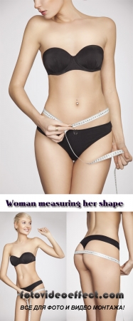 Stock Photo: Woman measuring her shape