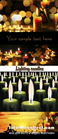 Stock Photo: Lighting candles