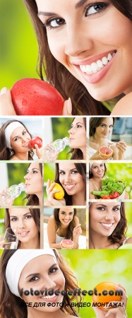 Stock Photo: Woman in fitness wear with apple