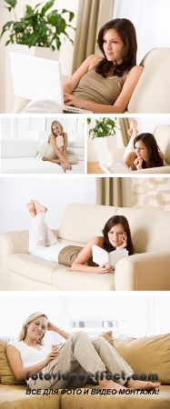 Stock Photo: House rest, girl lies on sofa, in drawing room