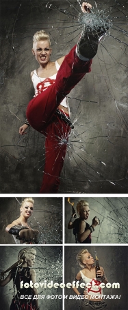 Stock Photo: Punk girl with a bat behind broken glass