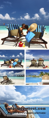 Stock Photo: Couple on a beach jetty at Maldives