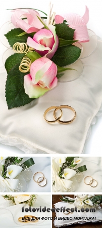 Stock Photo: Wedding rings with calla bouquet