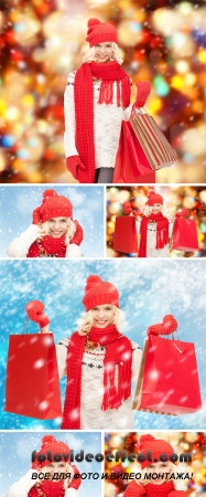 Stock Photo: Teenage girl in winter clothes with shoppin