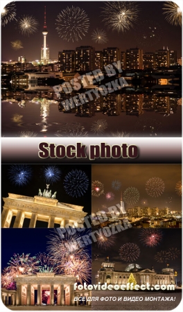      / Celebratory fireworks over night city - stock photos